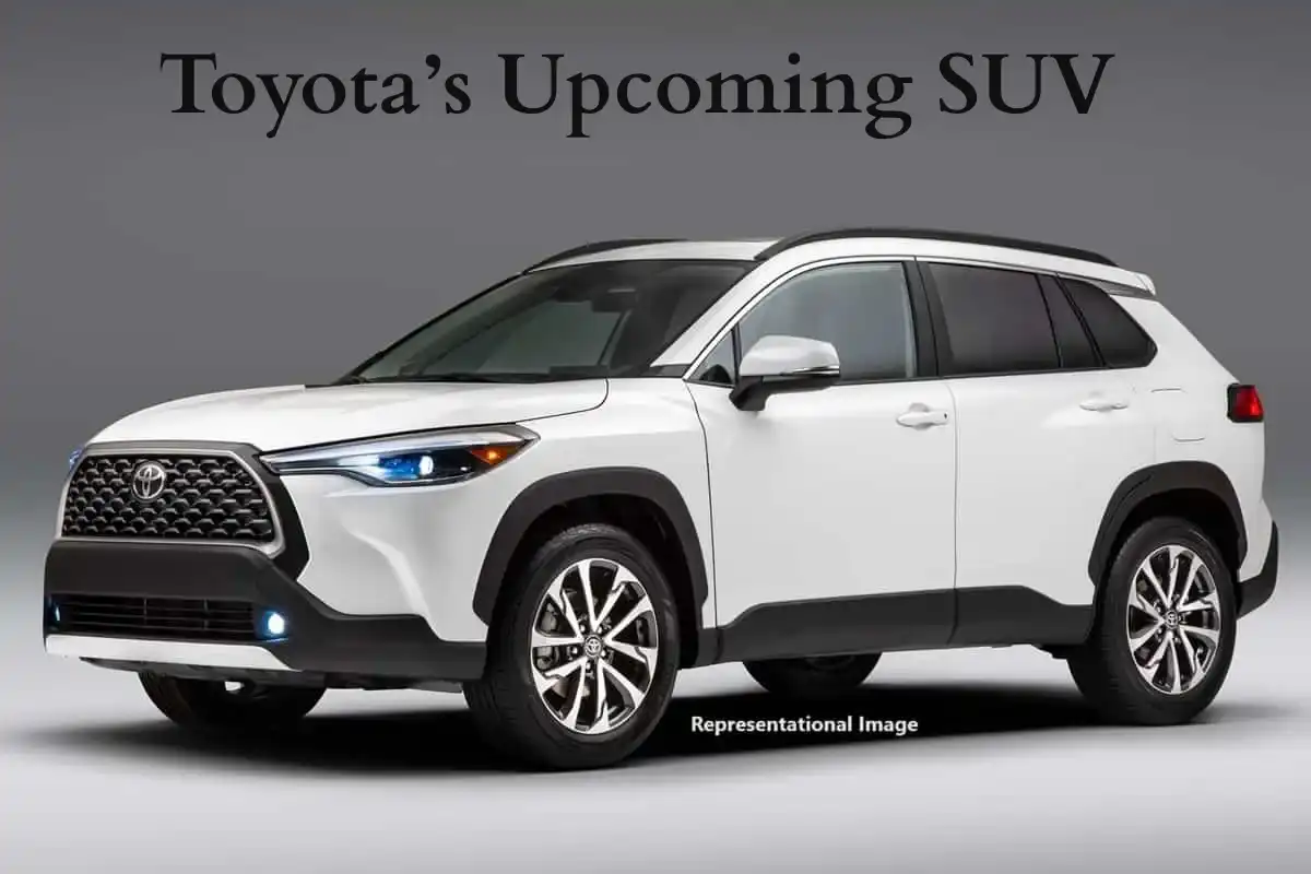 Front-side view of Toyota's upcoming 3-row SUV 2025 model in white, showcasing sleek headlamps and modern design